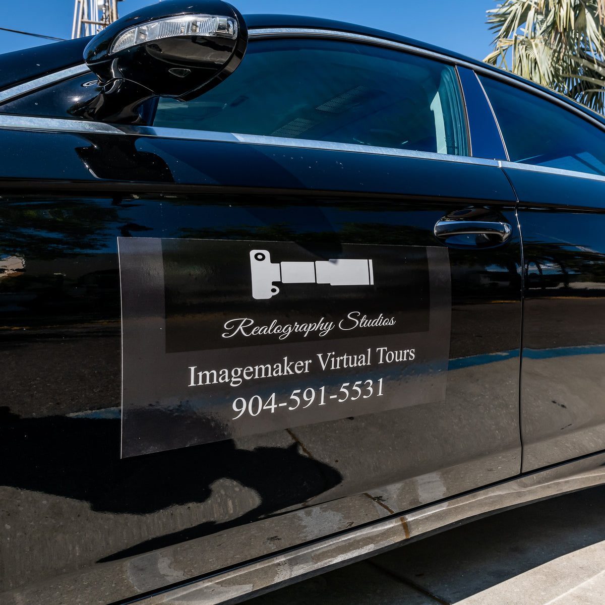 Magnet car graphic custom printed for Realography Studios to showcase their Virtual Tours offer and phone number on their car.