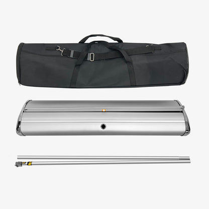 A black duffle bag, aluminum retractable banner base, and the stabilizing poles in front of a white background.