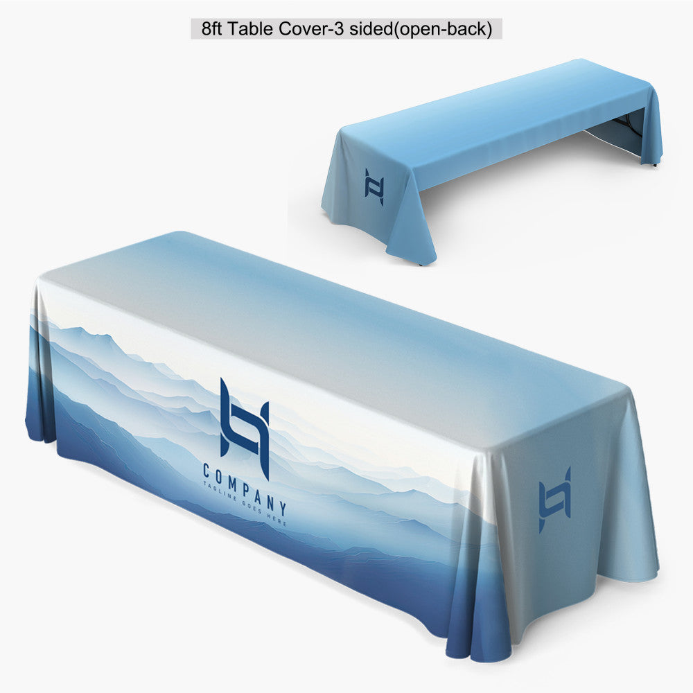 Custom printed 8ft 3-sided open-back fitted table cover featuring a full-bleed blue mountain landscape design and a white company logo on the front panel, produced by 760 Print in Vista.