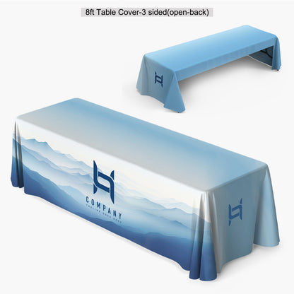 Custom printed 8ft 3-sided open-back fitted table cover featuring a full-bleed blue mountain landscape design and a white company logo on the front panel, produced by 760 Print in Vista.
