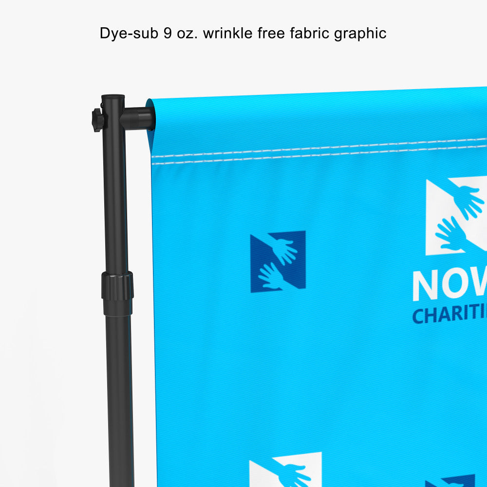 Close-up of a dye-sublimation wrinkle-free fabric graphic on a custom step and repeat backdrop stand, printed by 760 Print.