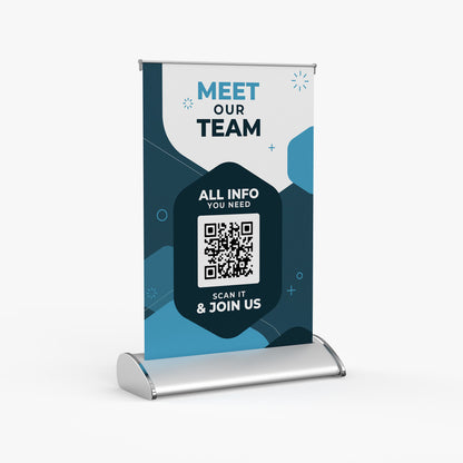 Custom printed tabletop retractable roll-up banner stand featuring a "Meet Our Team" design with a integrated QR code, produced by 760 Print in Vista.