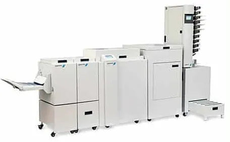 Plockmatic System 2000 booklet making and finishing system used in commercial print production for high-speed saddle-stitch booklet creation, trimming, folding, and stapling of digital print output.