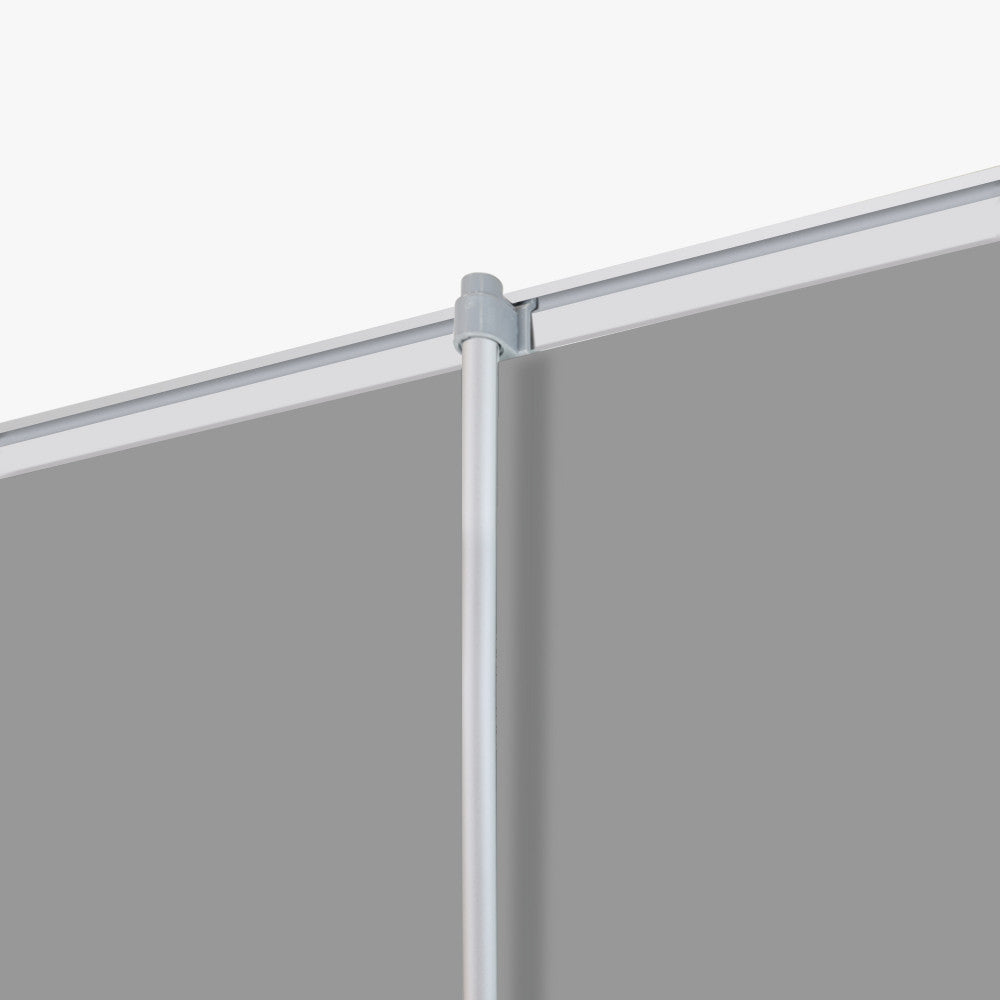 Close-up of the silver aluminum top snap rail clip securely holding the graphic material of a custom retractable banner, available at 760 Print in Vista.