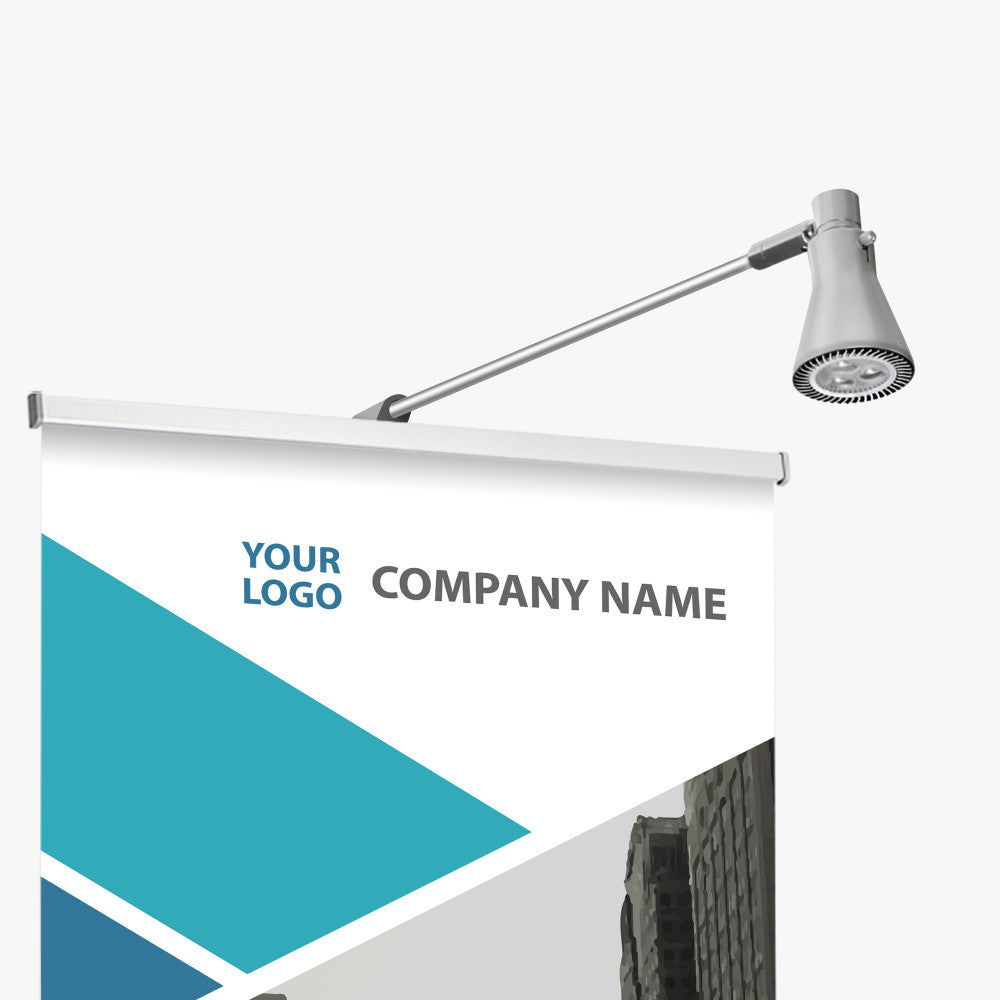 Silver spotlight attachment clipped to the top of a custom retractable banner template, perfect for trade shows and property management marketing in Vista.
