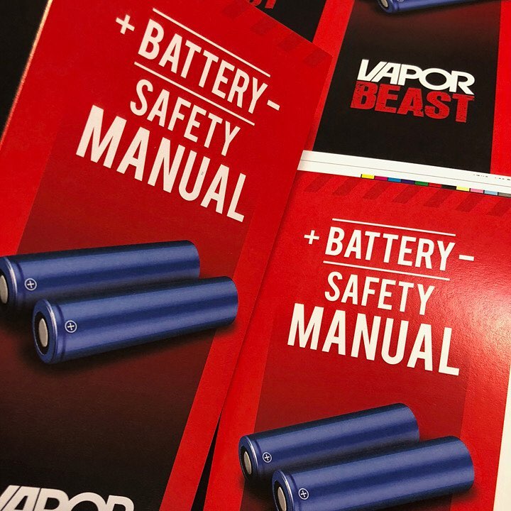 Two 'Vapor Beast' brochures with their battery safety manuals with blue batteries on a red background.